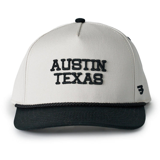 White and black cap with 'Austin Texas' text on a white background