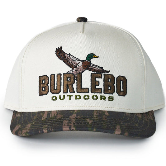 White cap with camouflage brim and Burlebo Outdoors logo on a white background