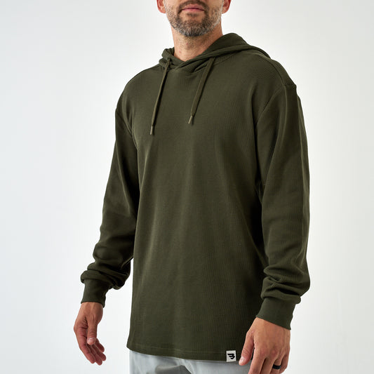 Man wearing the Mallard Green Thermal Hoodie, front view with drawstrings and hem logo tag