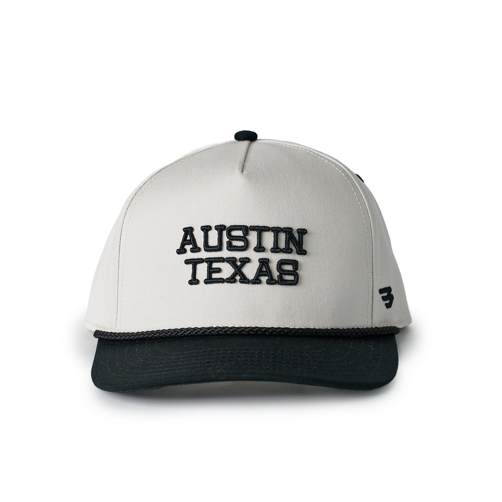 White and black cap with 'Austin Texas' text on a white background