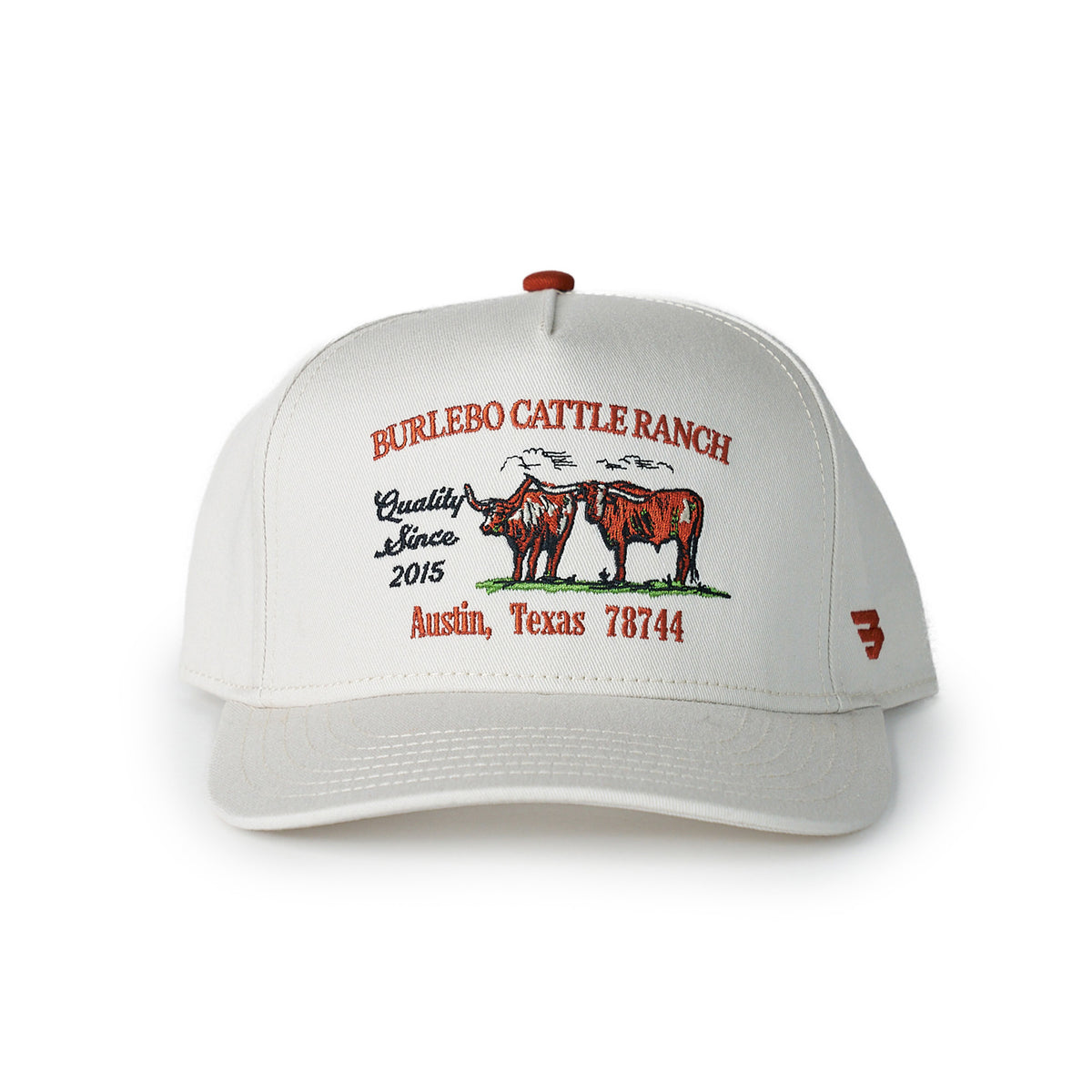 White cap with red and black text and graphics on a white background