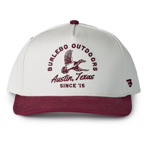 Cap with 'Burlesco Outdoors Austin, Texas Since '15' text and logo on a white background