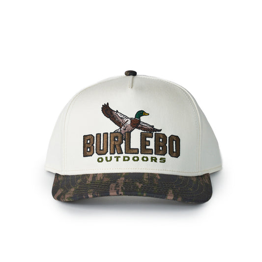 White cap with camouflage brim and Burlebo Outdoors logo on a white background