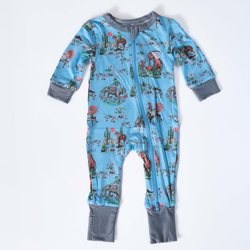 Children's onesie with a desert animal pattern on a white background