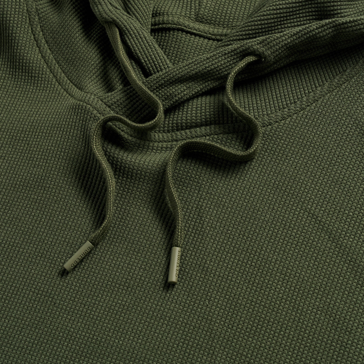 Detail of the Mallard Green Thermal Hoodie drawstrings and tipped ends