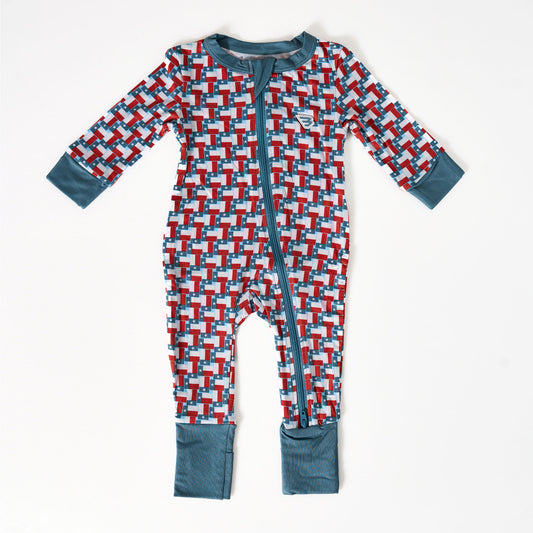 Children's onesie with geometric pattern on a white background