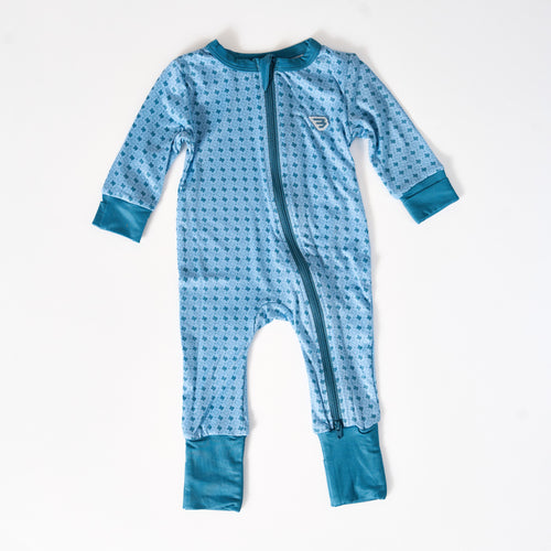 Blue baby onesie with a pattern on a white background